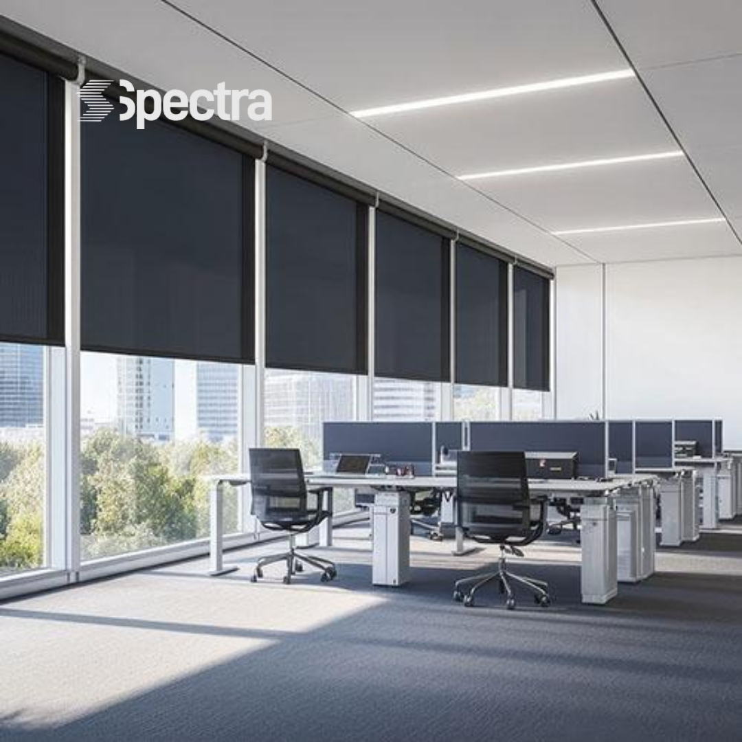 Black roller blinds installed in a commercial office