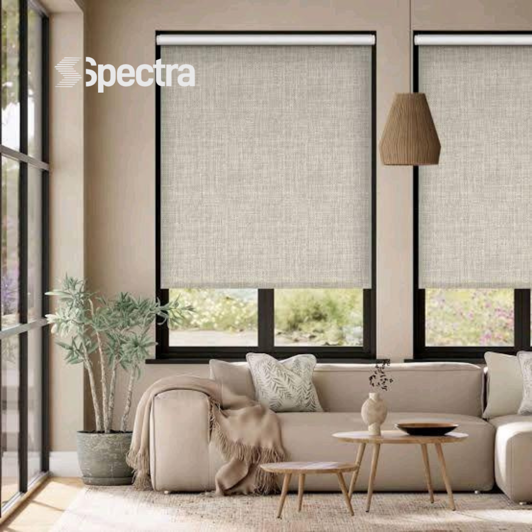 Linen roller blinds installed in a living room