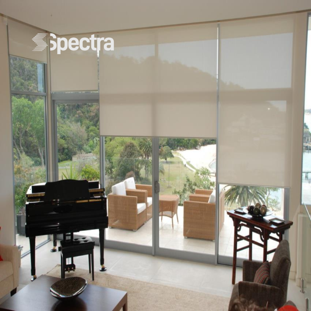 White roller blinds installed in a contemporary living room